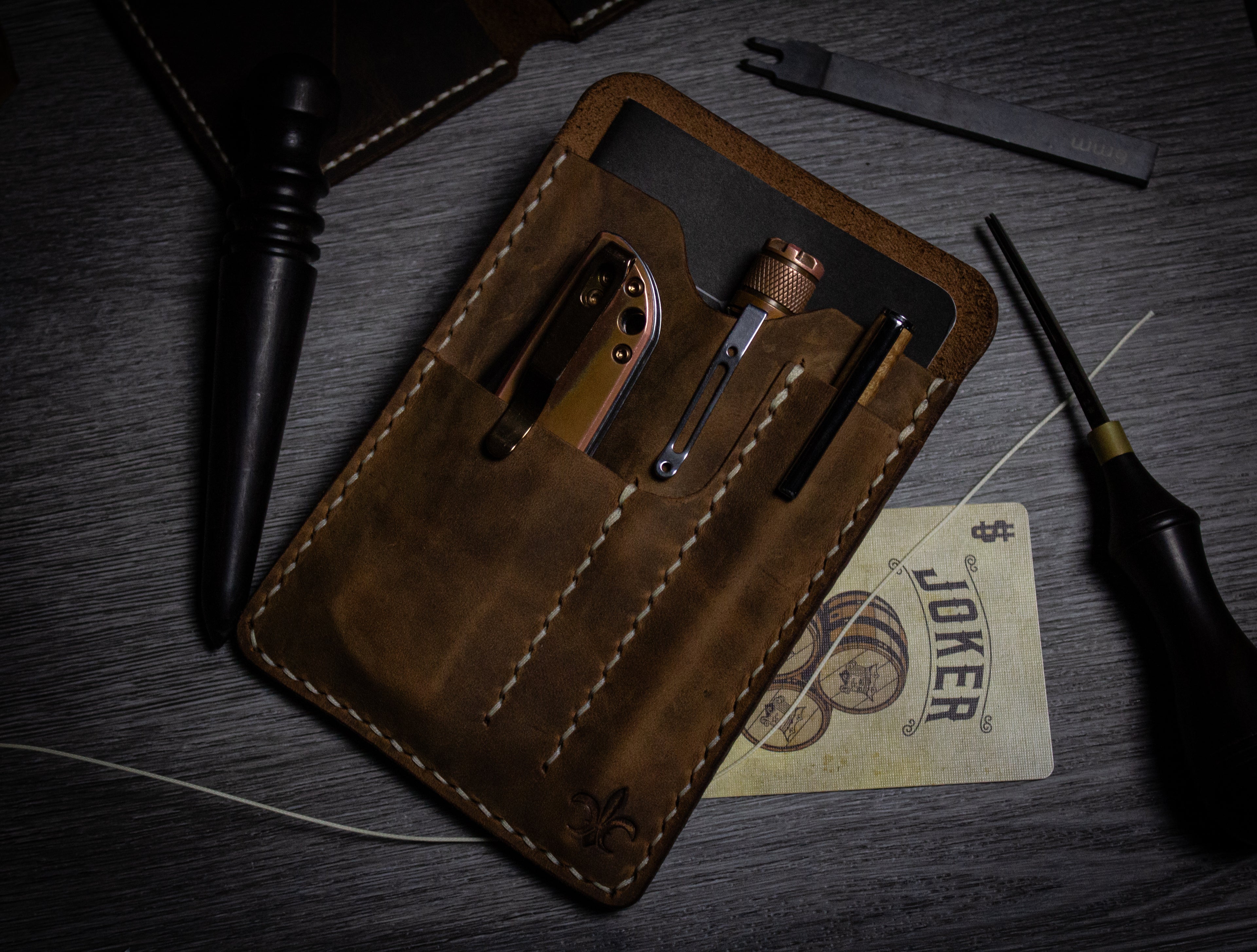 The Sidekick, leather pocket organizer, front image with items sideways