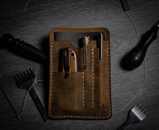The Sidekick, leather pocket organizer, front image with items in